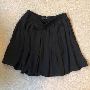 Black pleaded skirt